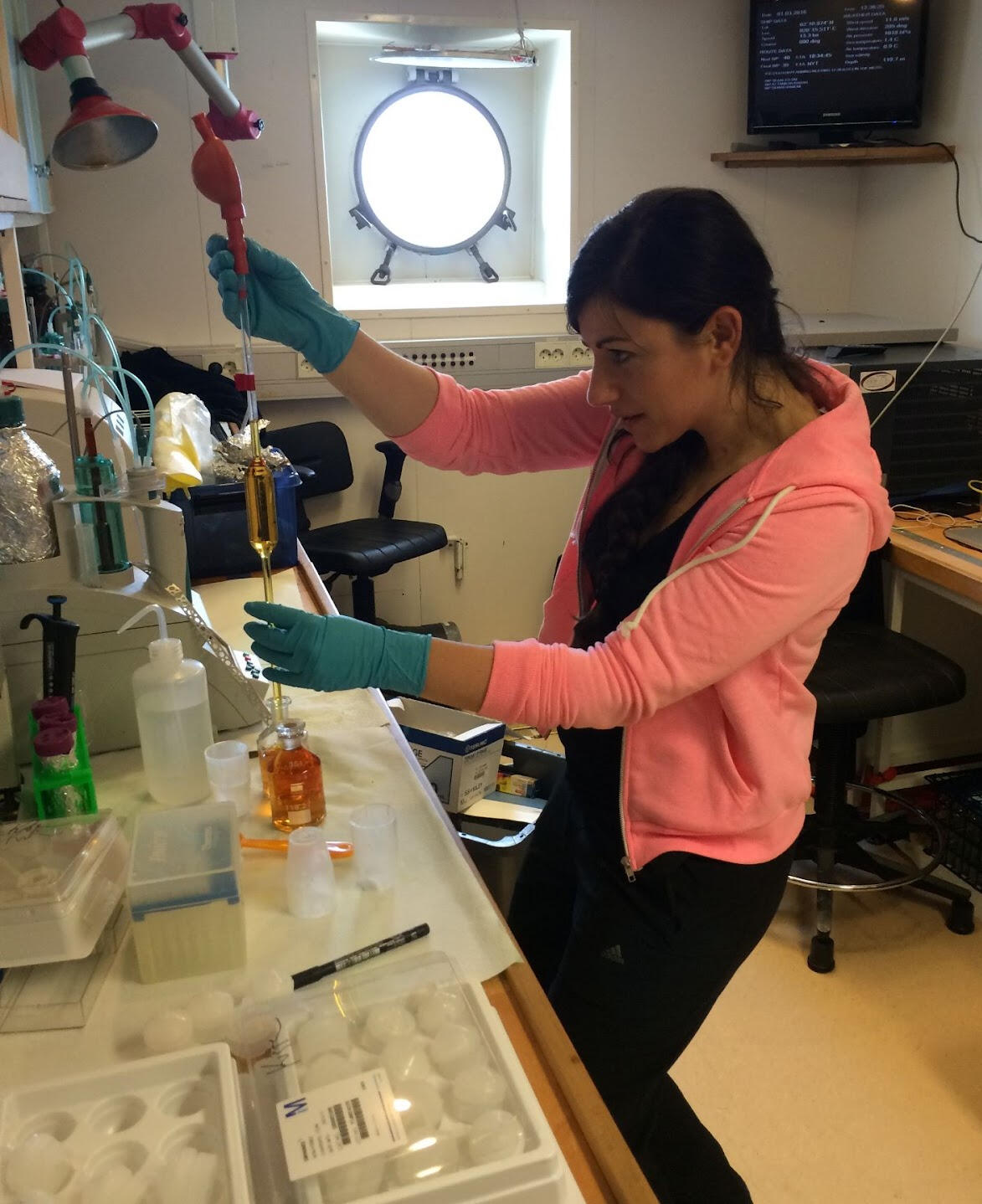 Letizia Tedesco working in the lab, on board RV Aranda, Baltic sea ice cruise